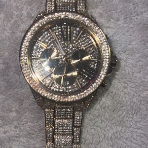 Gold men’s Micheal Kor watch